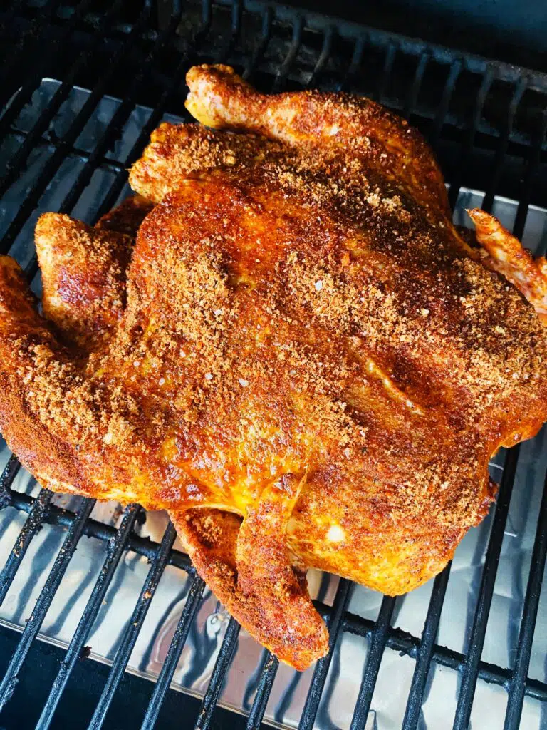 chicken on the smoker before cooking