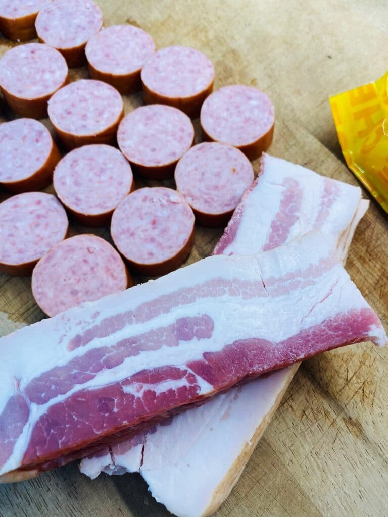 sliced bacon and sausage