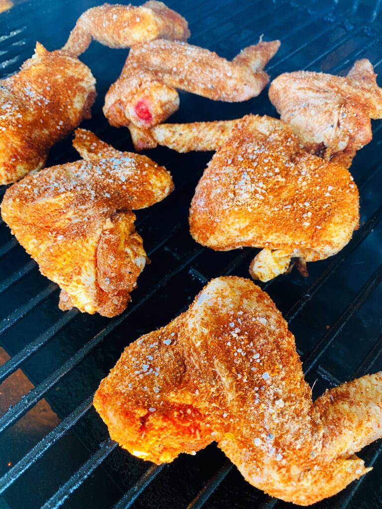 wings on the smoker before cooking