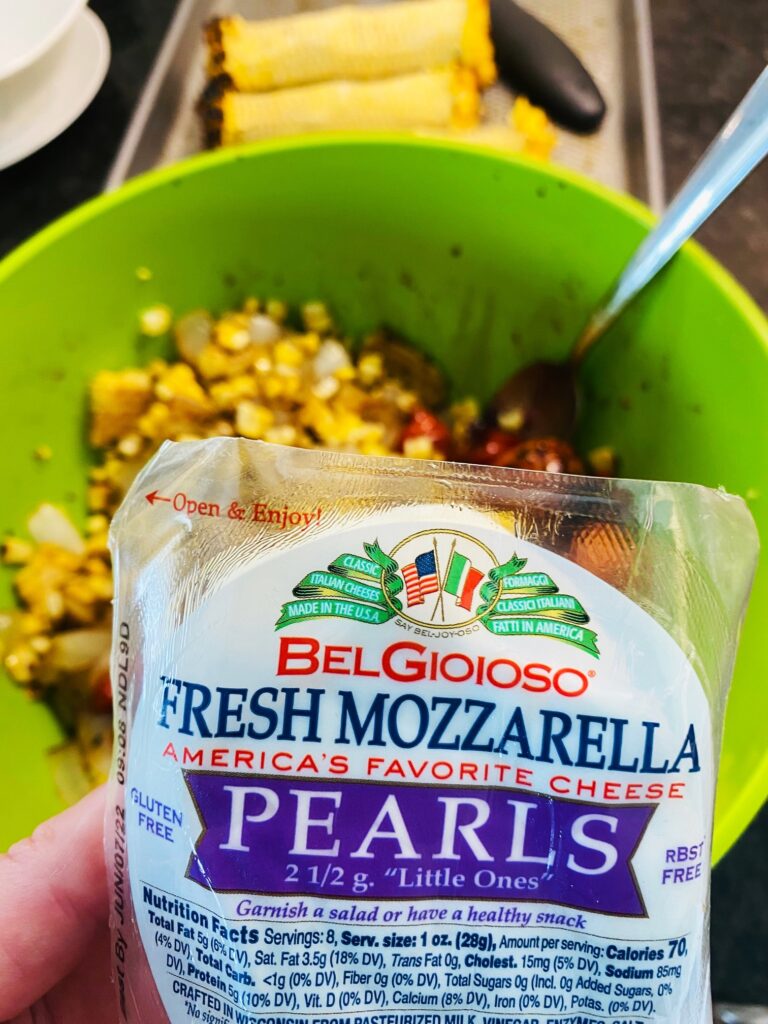 adding fresh mozzarella