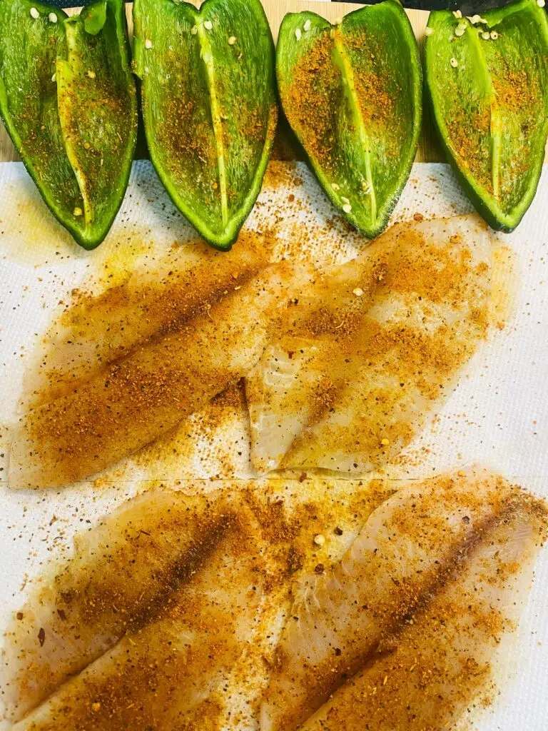 seasoned fish and poblano peppers