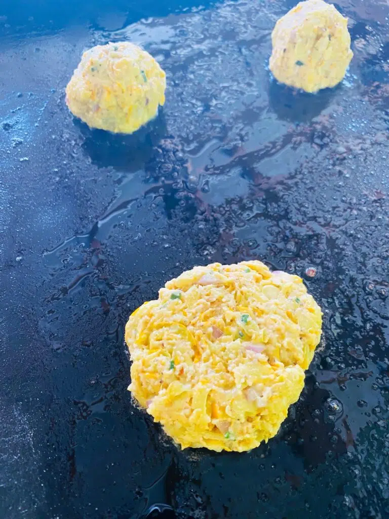 fritter on the griddle before cooking