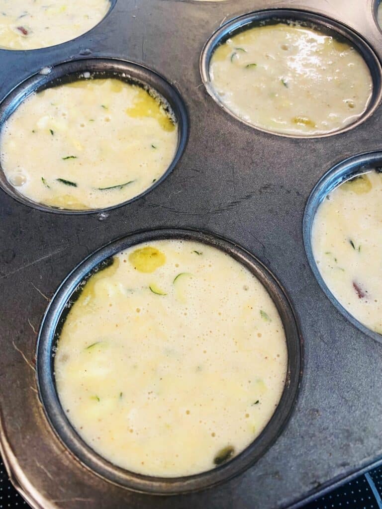 filling the muffin tins
