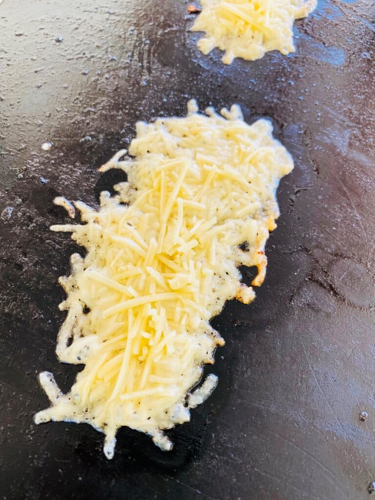 cheese on the griddle before cooking
