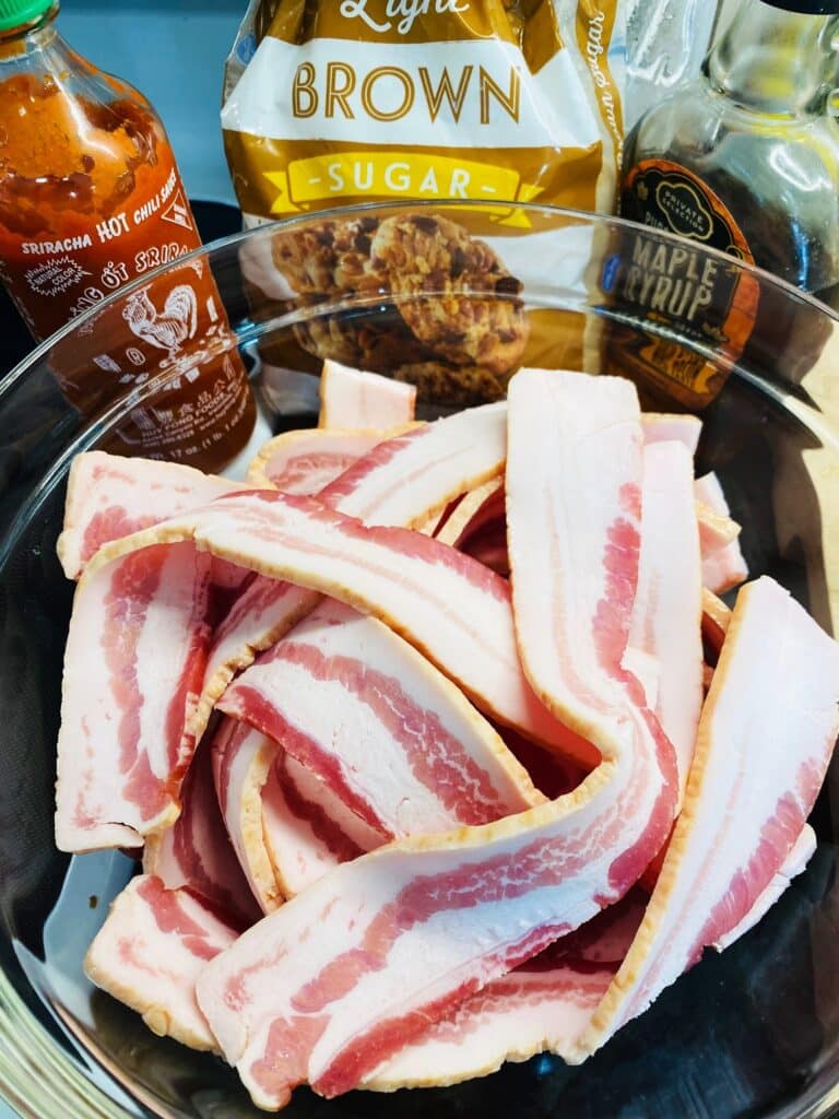 bacon in a bowl with glaze ingredients