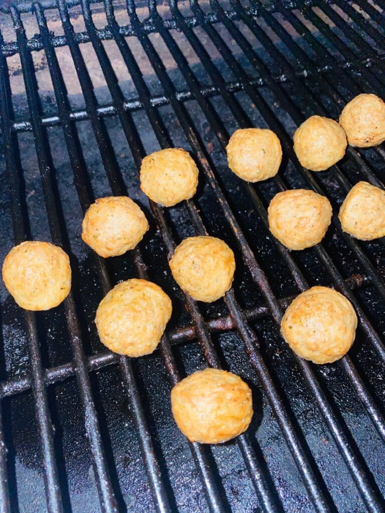 Meatballs on the pellet grill after smoking