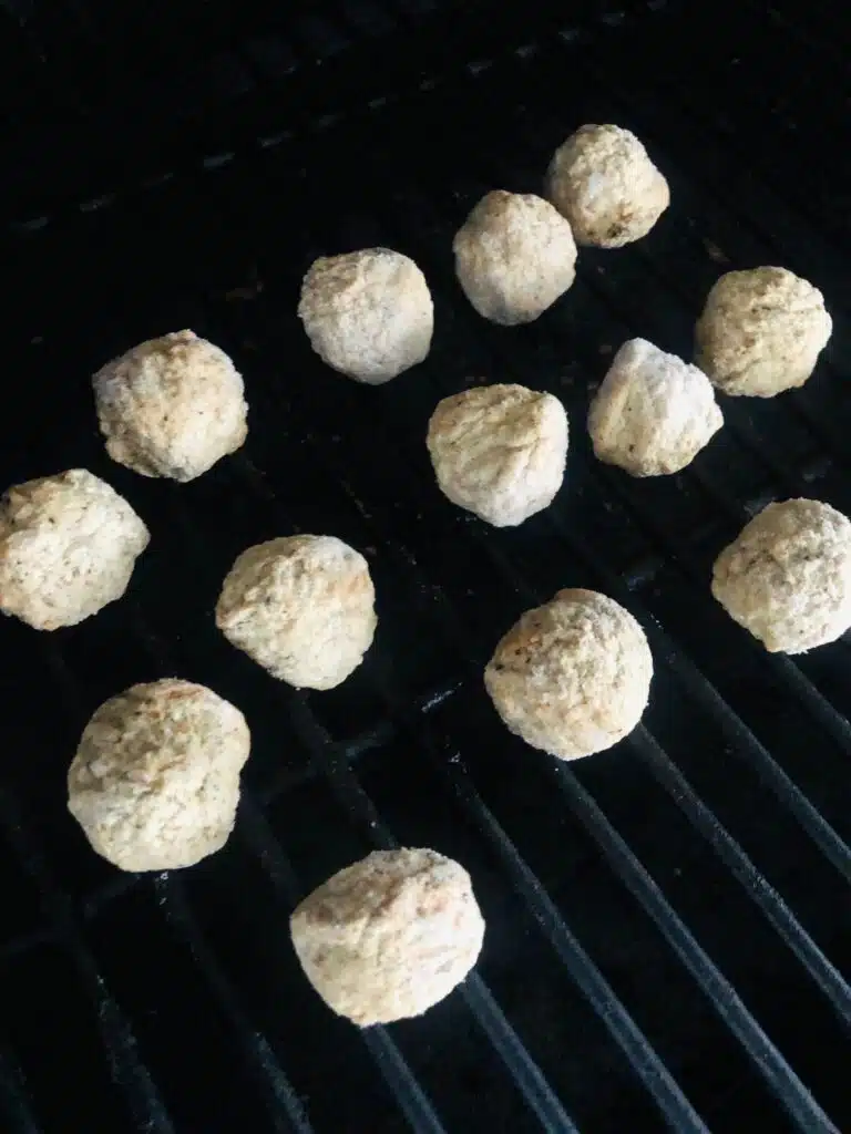 Meatballs on the pellet grill before cooking