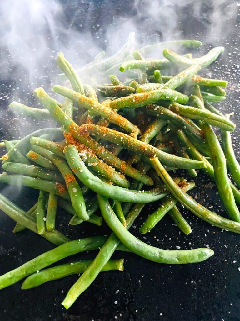 Seasoned green beans on the Blackstone griddle