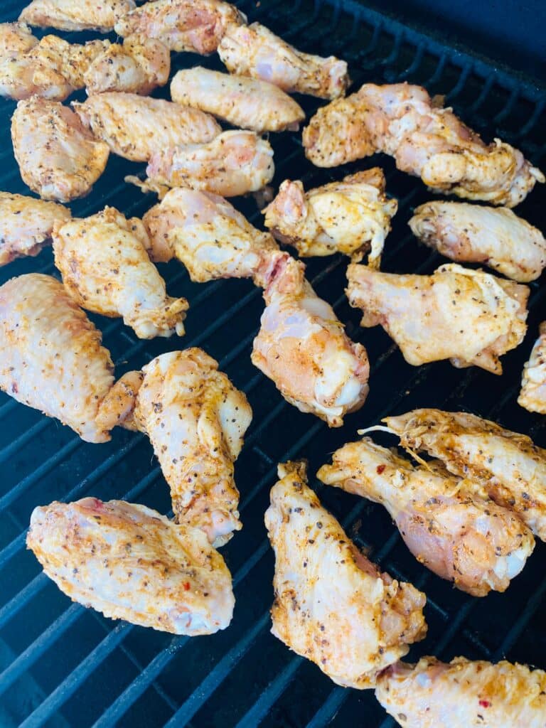 wings on the smoker before cooking