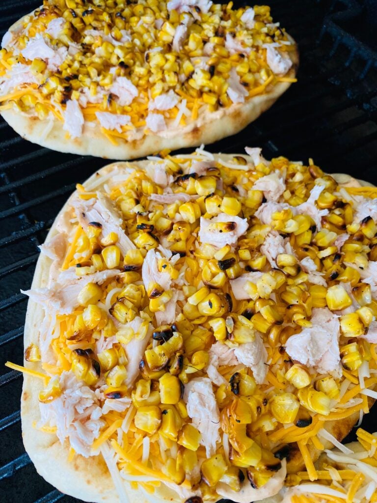 pizzas on the Traeger before cooking