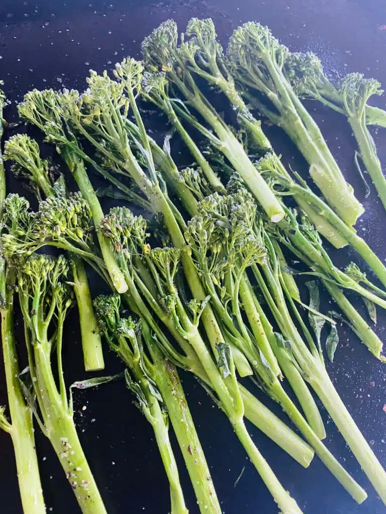 broccolini on the griddle before cooking