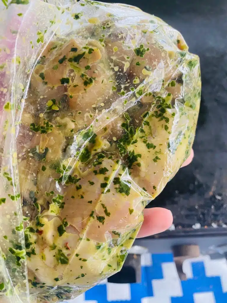 marinating chicken bites in a plastic bag