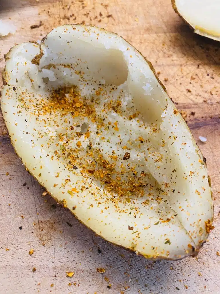 hollowed out potato skin with barbecue seasoning