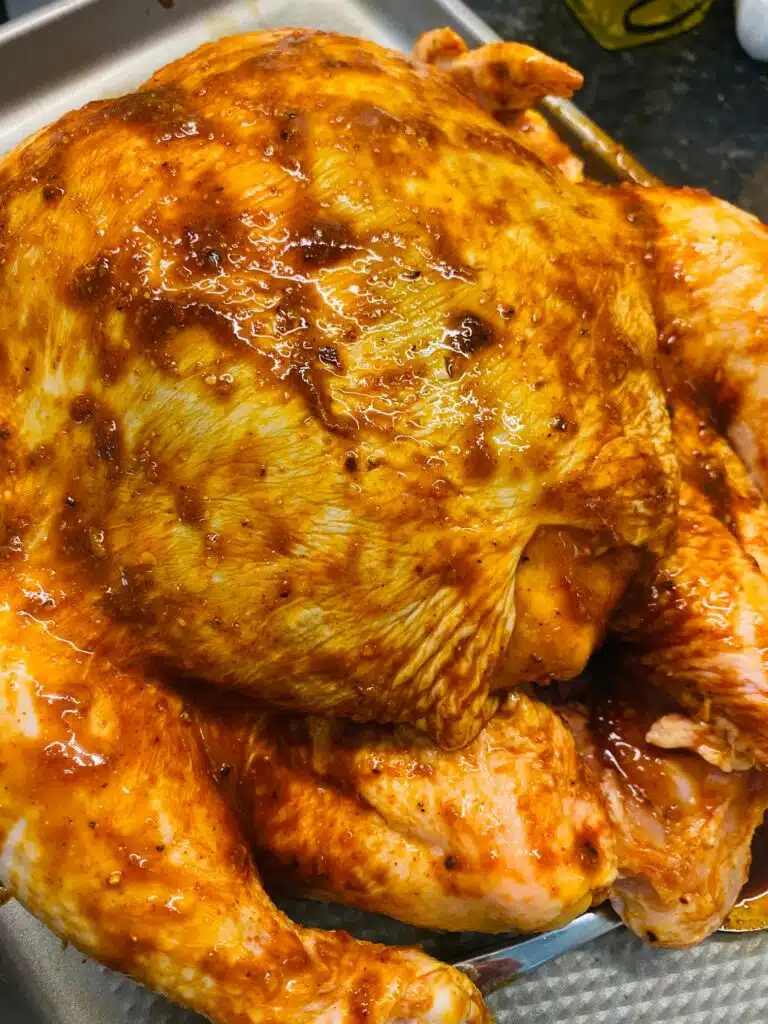 whole chicken with the garlic sriracha rub before cooking
