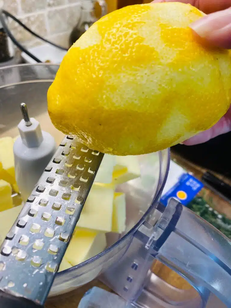 zesting a lemon into the butter