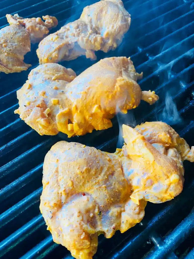 chicken on the grill before cooking