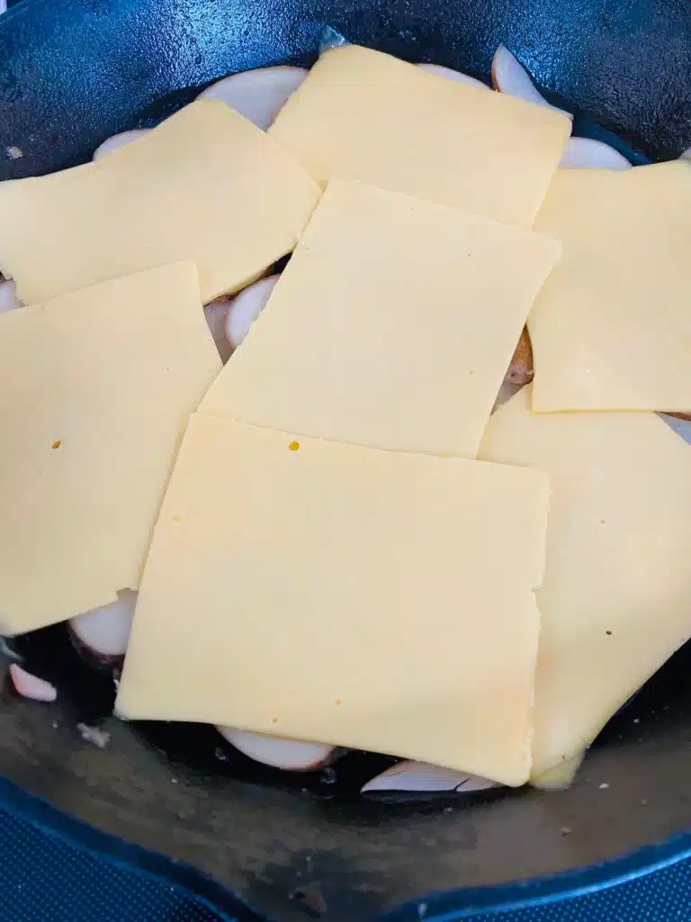first layer of potatoes and cheese