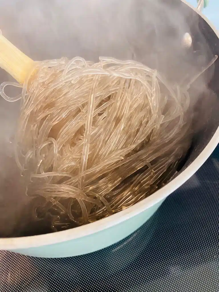 boiling the sweet potato noodles
