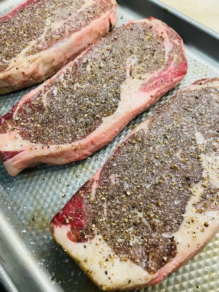seasoned steak before grilling