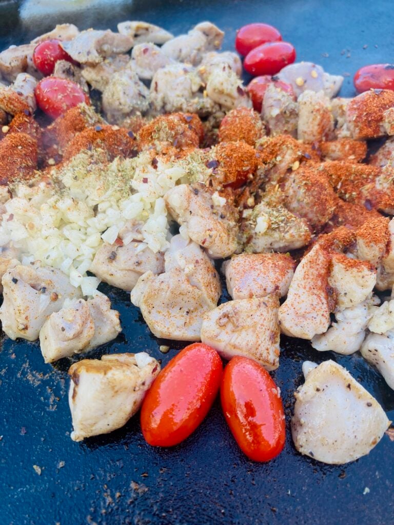 adding the garlic and seasonings