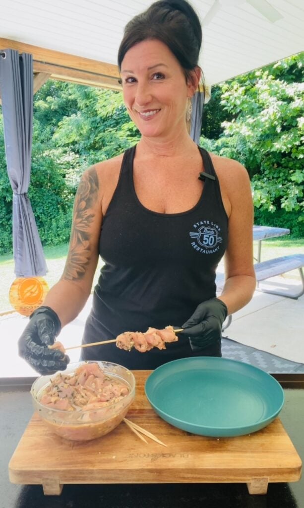making the Blackstone Lemon Hot Honey Chicken Skewers
