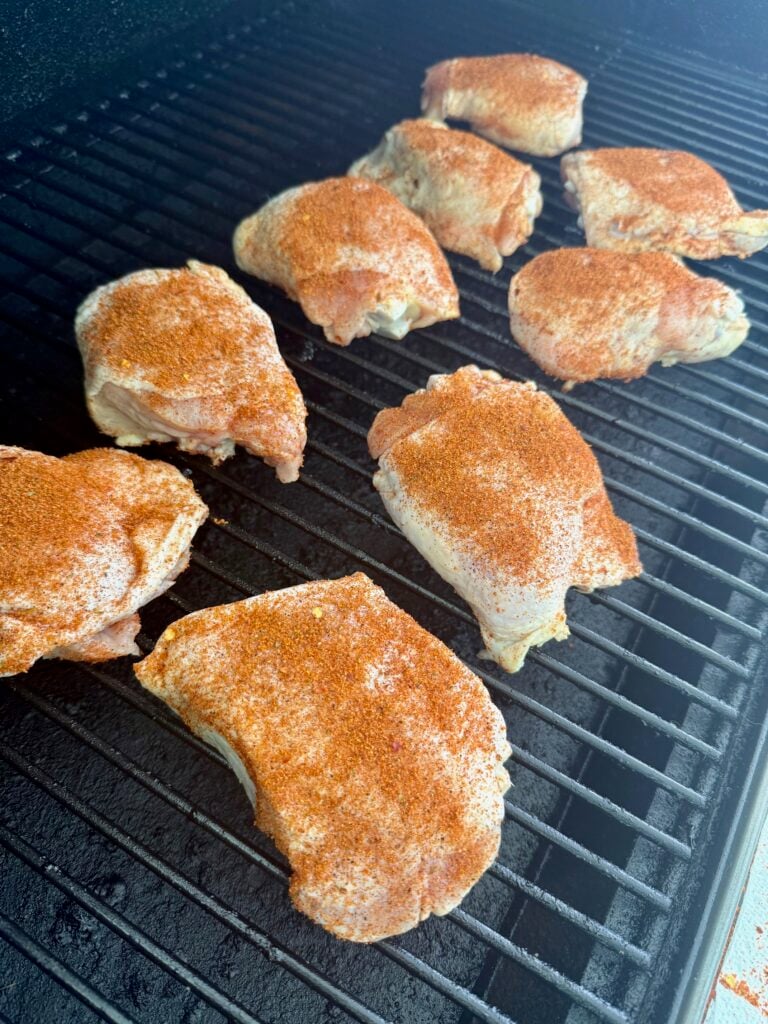 Smoked Tequila Brined Chicken Thighs on smoker before cooking