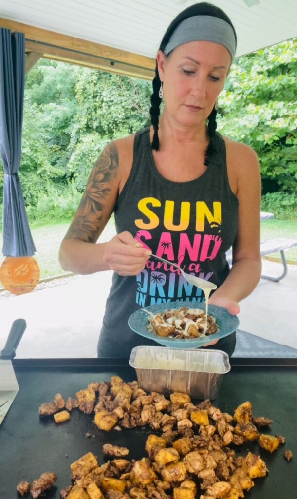 adding queso to Blackstone Cheesy Chorizo Chicken and Pineapple