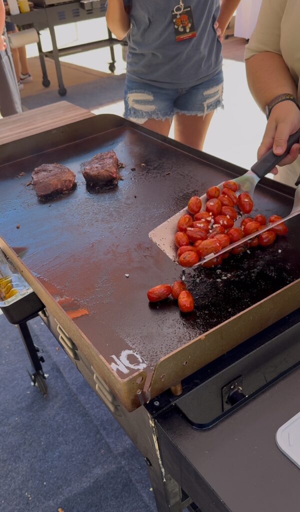 steak and tomatoes on griddle