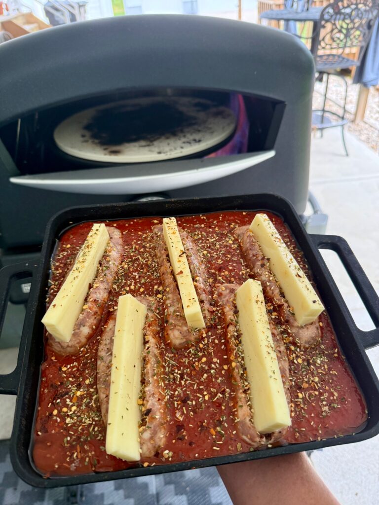 Blackstone Pizza Oven Stuffed Sausages before cooking