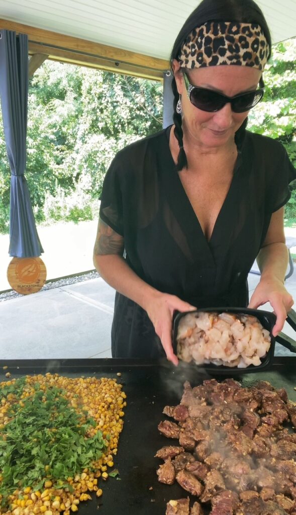 adding lobster for Blackstone Steak and Lobster Tacos