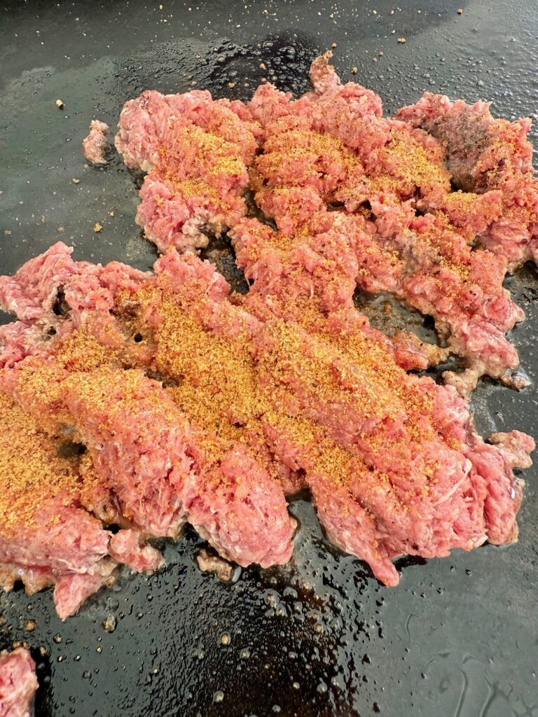 making ground beef on the griddle