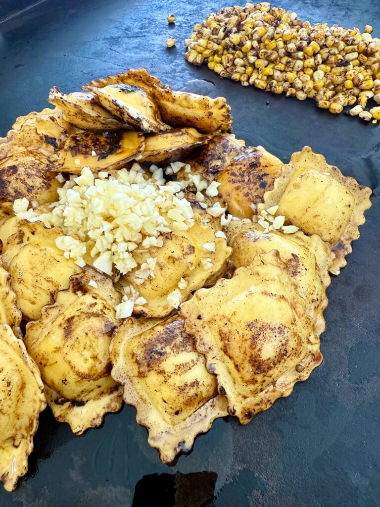 adding garlic to ravioli