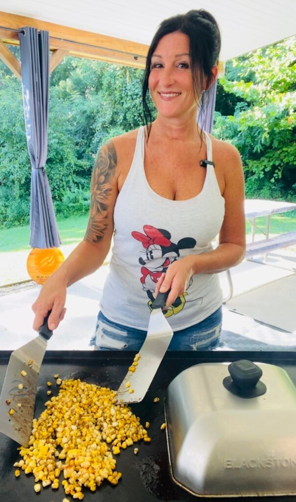 ravioli covered with melting dome on griddle