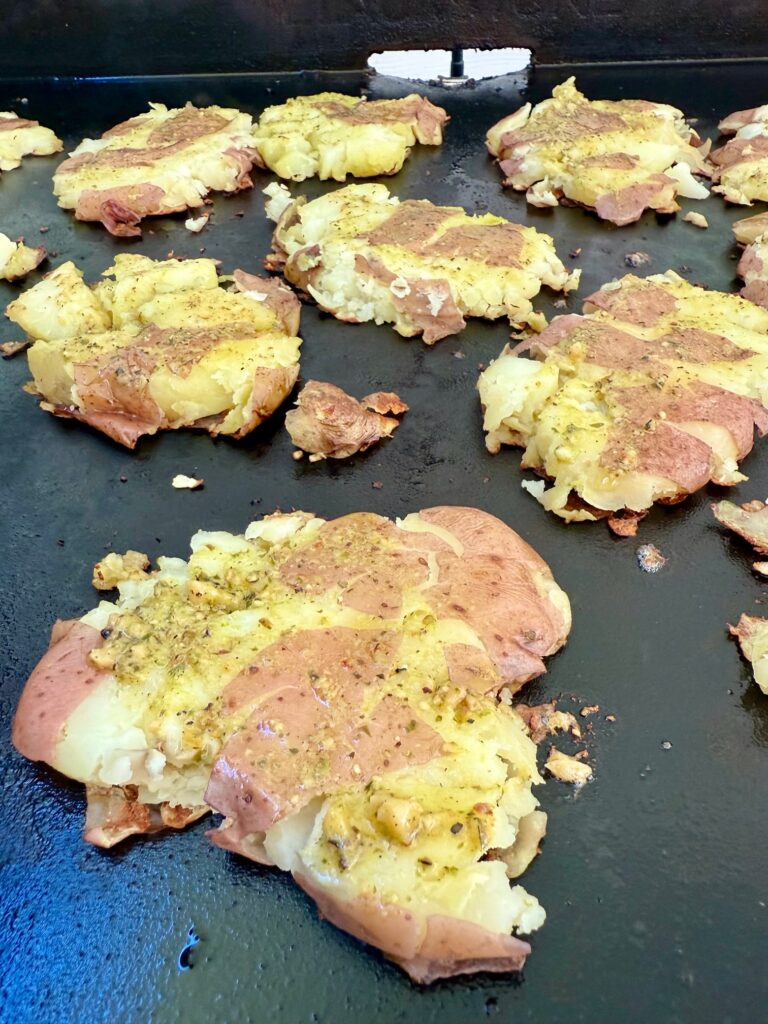 Blackstone Cheesy Pesto Smashed Potatoes