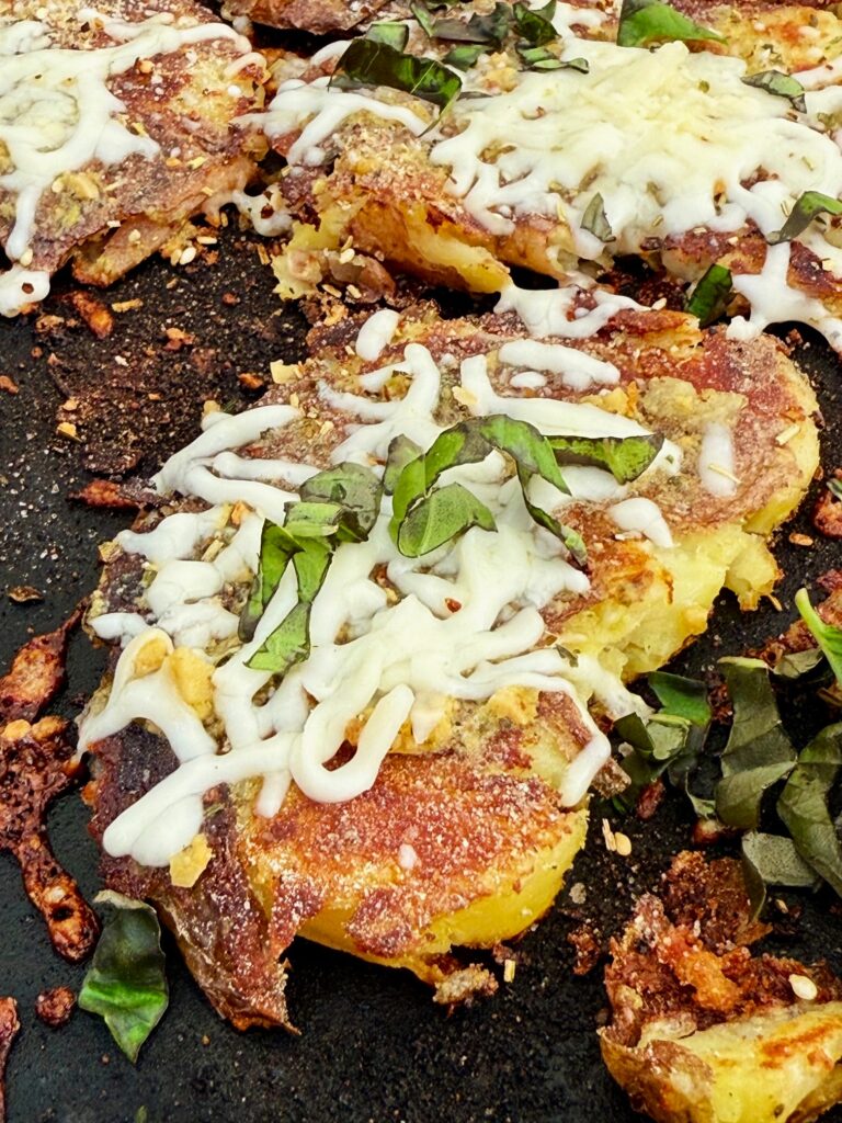 Blackstone Cheesy Pesto Smashed Potatoes
