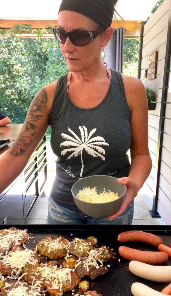 adding cheese to potatoes