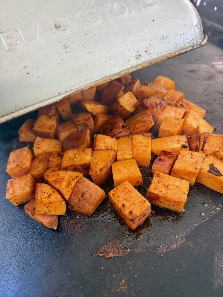 sweet potatoes cooking on griddle