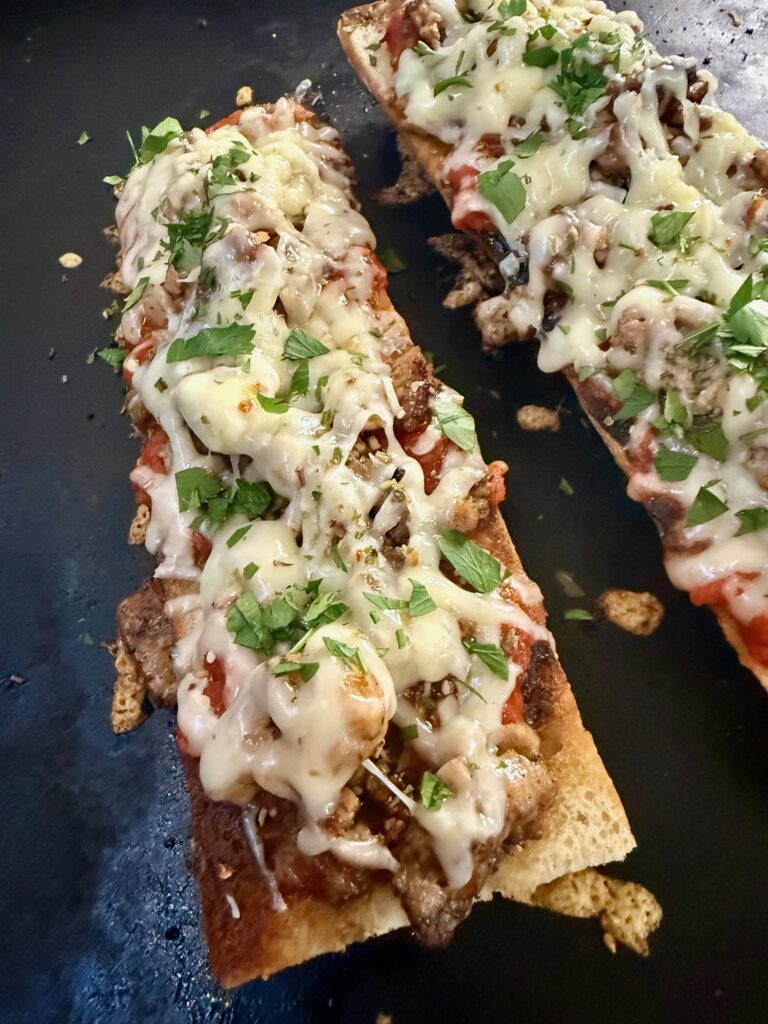 Blackstone Cheesy Sausage Baguettes