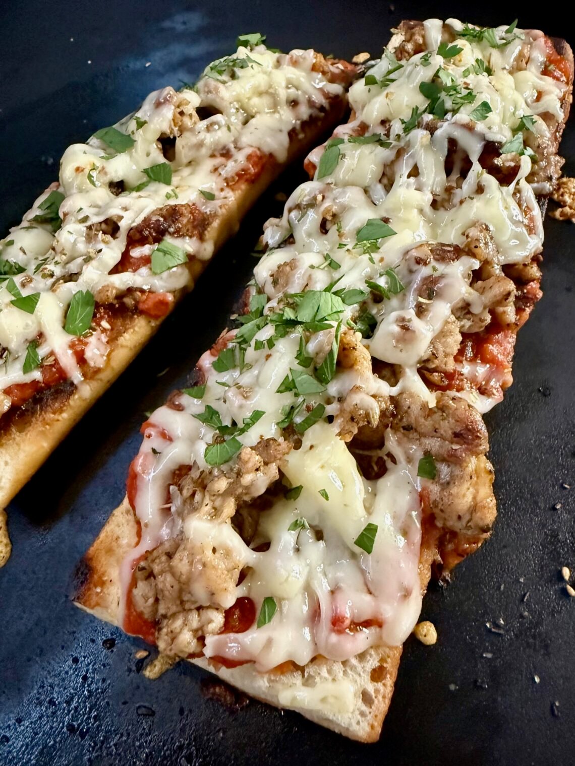 Blackstone Cheesy Sausage Baguettes