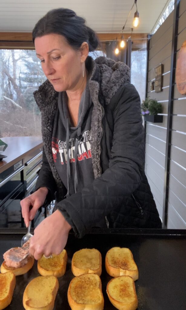 making the Blackstone Chicken Caesar Garlic Toast