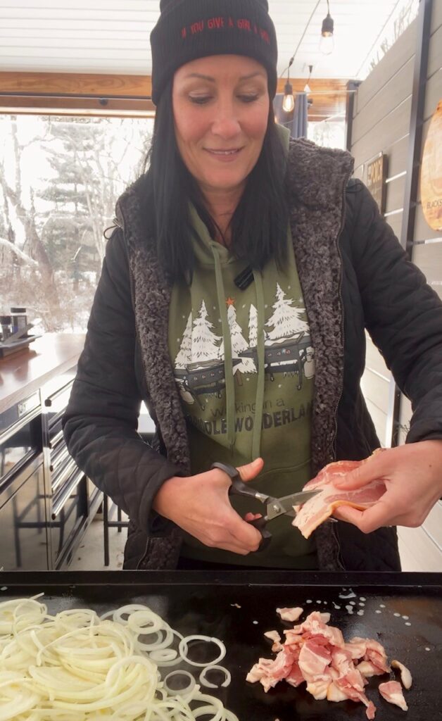 adding bacon to the griddle