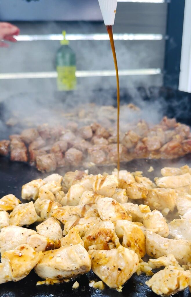 adding teriyaki sauce