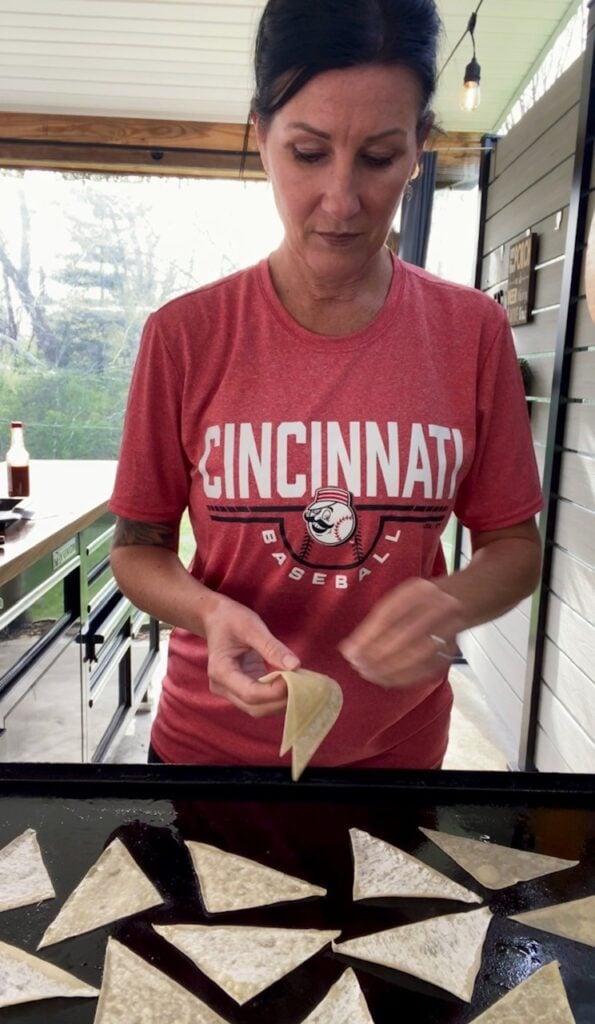 adding wonton wrappers to griddle