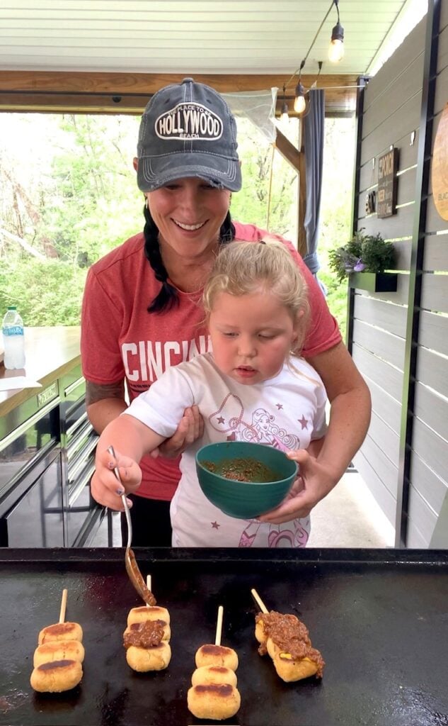 adding chili over top