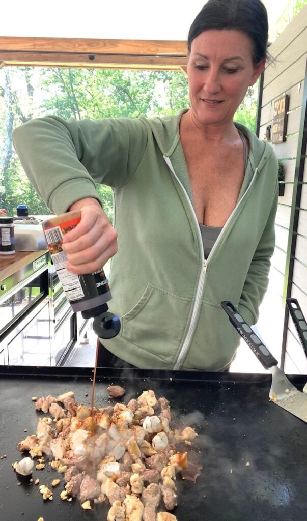 adding teriyaki sauce