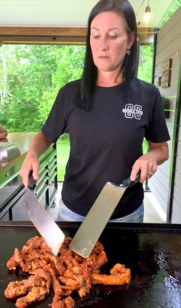 cooking steak on the griddle