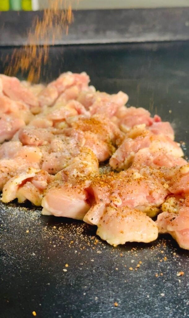chicken cooking on the griddle