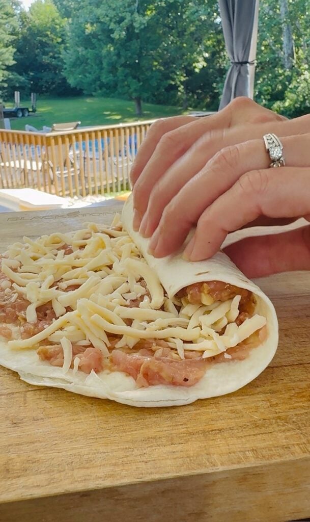 rolling up the tortillas