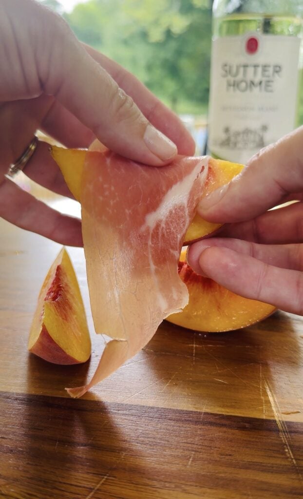 wrapping the peaches in proscuitto