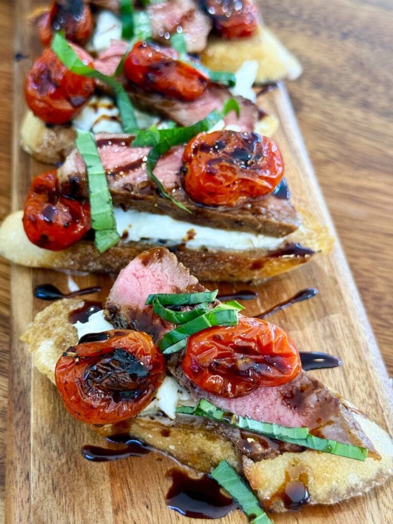 Blackstone Steak Caprese Crostini